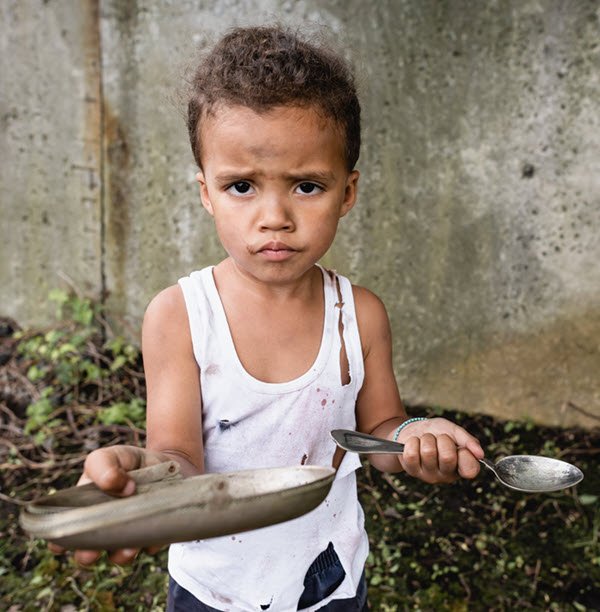 Homeless boy begging for food